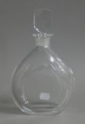 An Orrefors glass decanter, signed. 24 cm high.