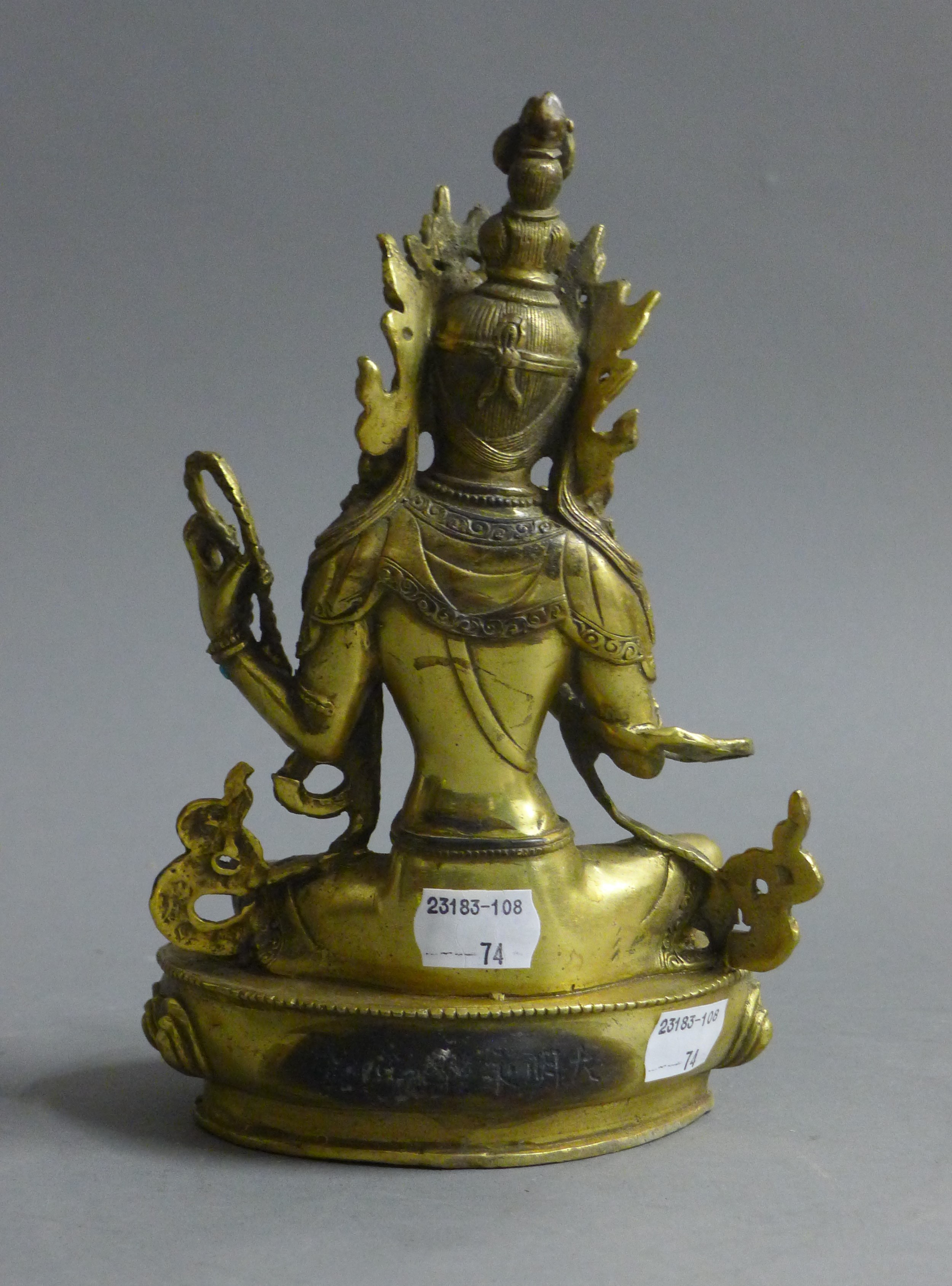 A gilt bronze figure of Buddha decorated with turquoise and coral. 21.5 cm high. - Image 4 of 5