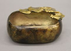 A Chinese patinated bronze brush washer with applied gilt gold fish and lily pads,