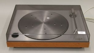 A Bang and Olufsen record deck tuner and boxed amp.