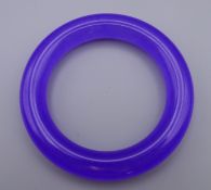 A lavender jade bangle. Internal diameter 6 cm.