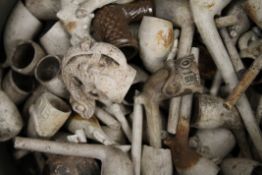 A collection of clay pipes.