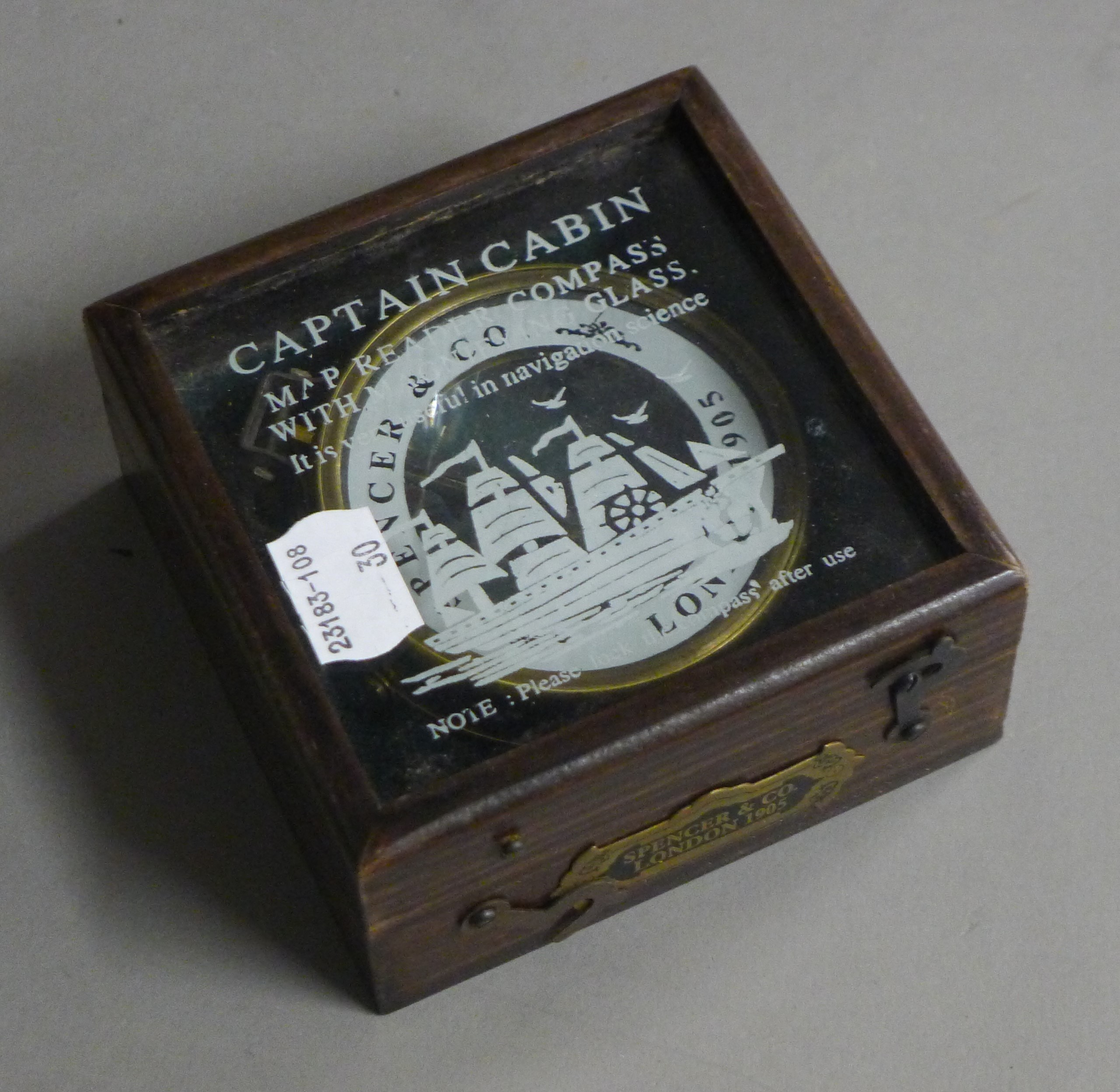 A boxed compass.