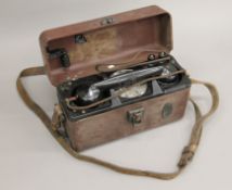 A vintage cased travelling telephone.