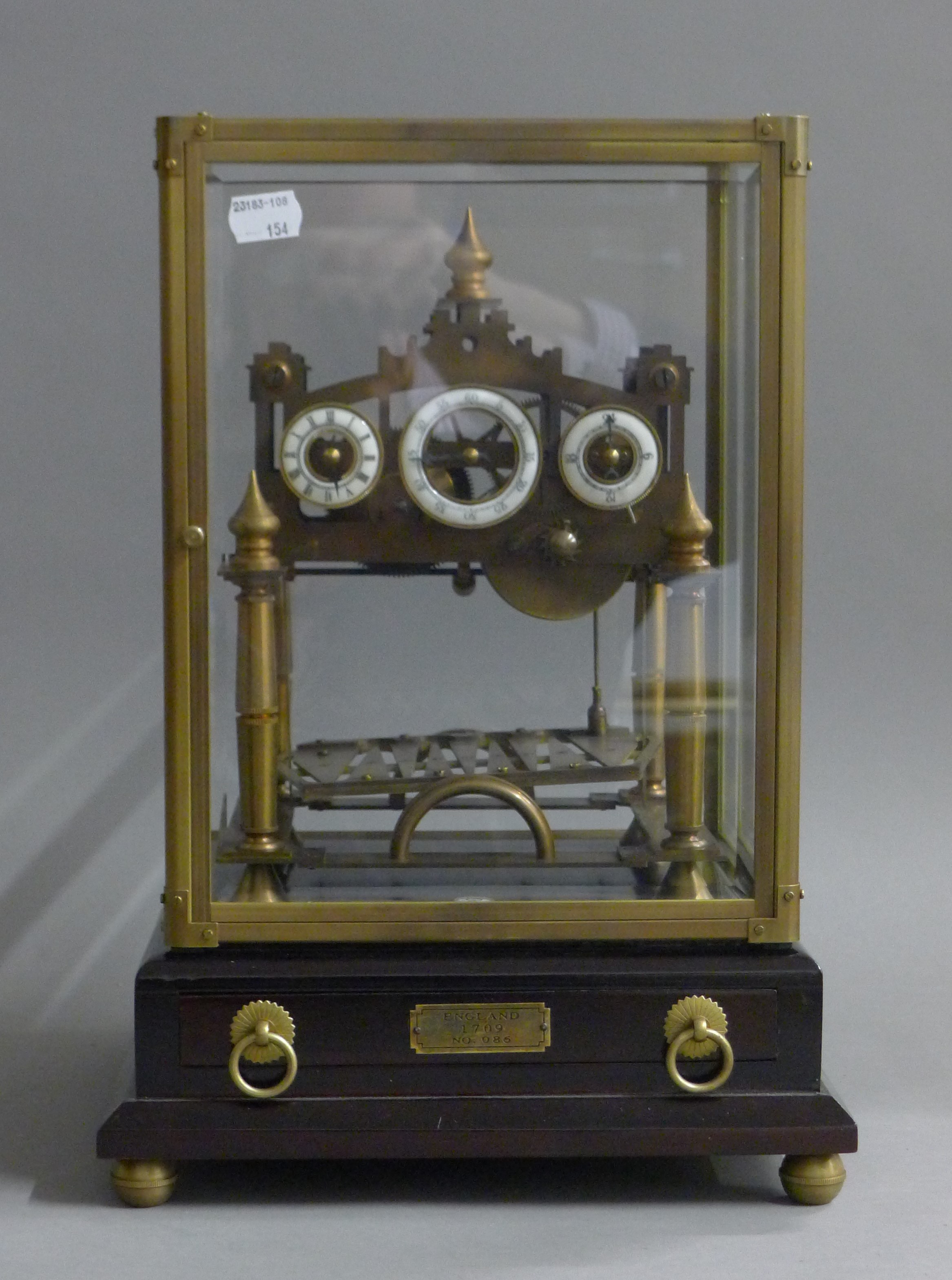 A Congreave clock. 39 cm high.