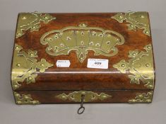 A Victorian brass and walnut playing card box. 26.5 cm wide.