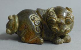 A jade dog-of-fo. 12 cm long.