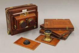 A Wratten & Wainwright stereo camera, Thornton Pickard stereo shutter and 3 dark slides.