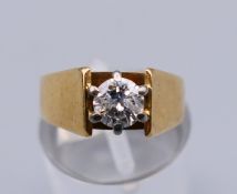 An 18 ct gold diamond solitaire ring, the stone spreading to approximately 0.5 of a carat.