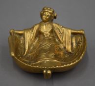 A novelty bronze 'rude' ashtray formed as a geisha. 11.5 cm wide.