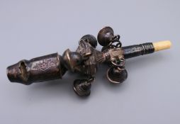 A George III silver baby's rattle by Peter and Anne Bateman, circa 1800. 12 cm long.