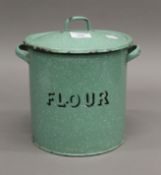 A vintage enamel flour bin. 24 cm high.