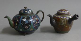 Two cloisonne teapots. The largest 15 cm long.