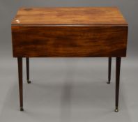 A George III mahogany Pembroke table. 82.5 cm long.