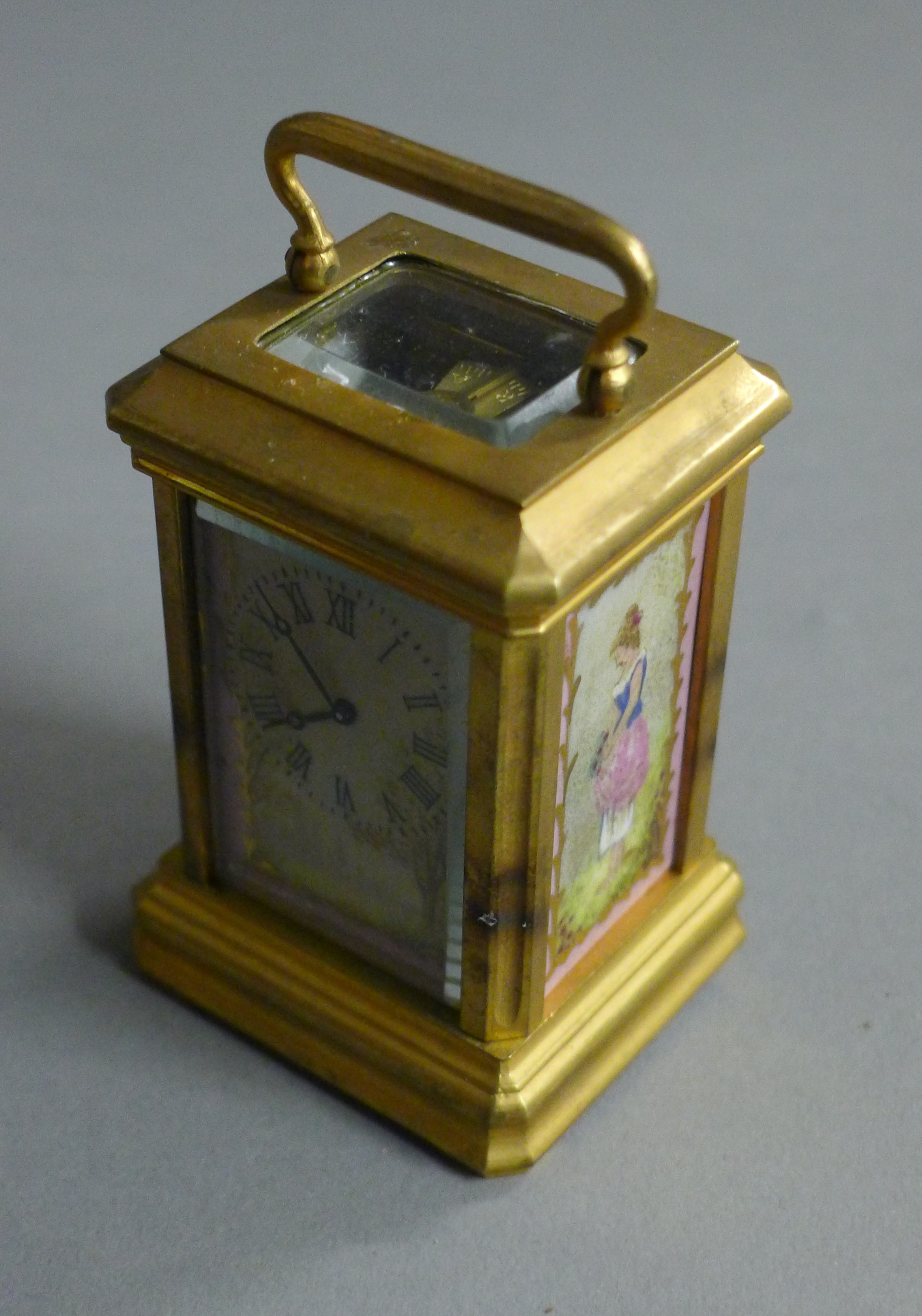 A miniature carriage clock set with porcelain panels. 9 cm high. - Image 6 of 6