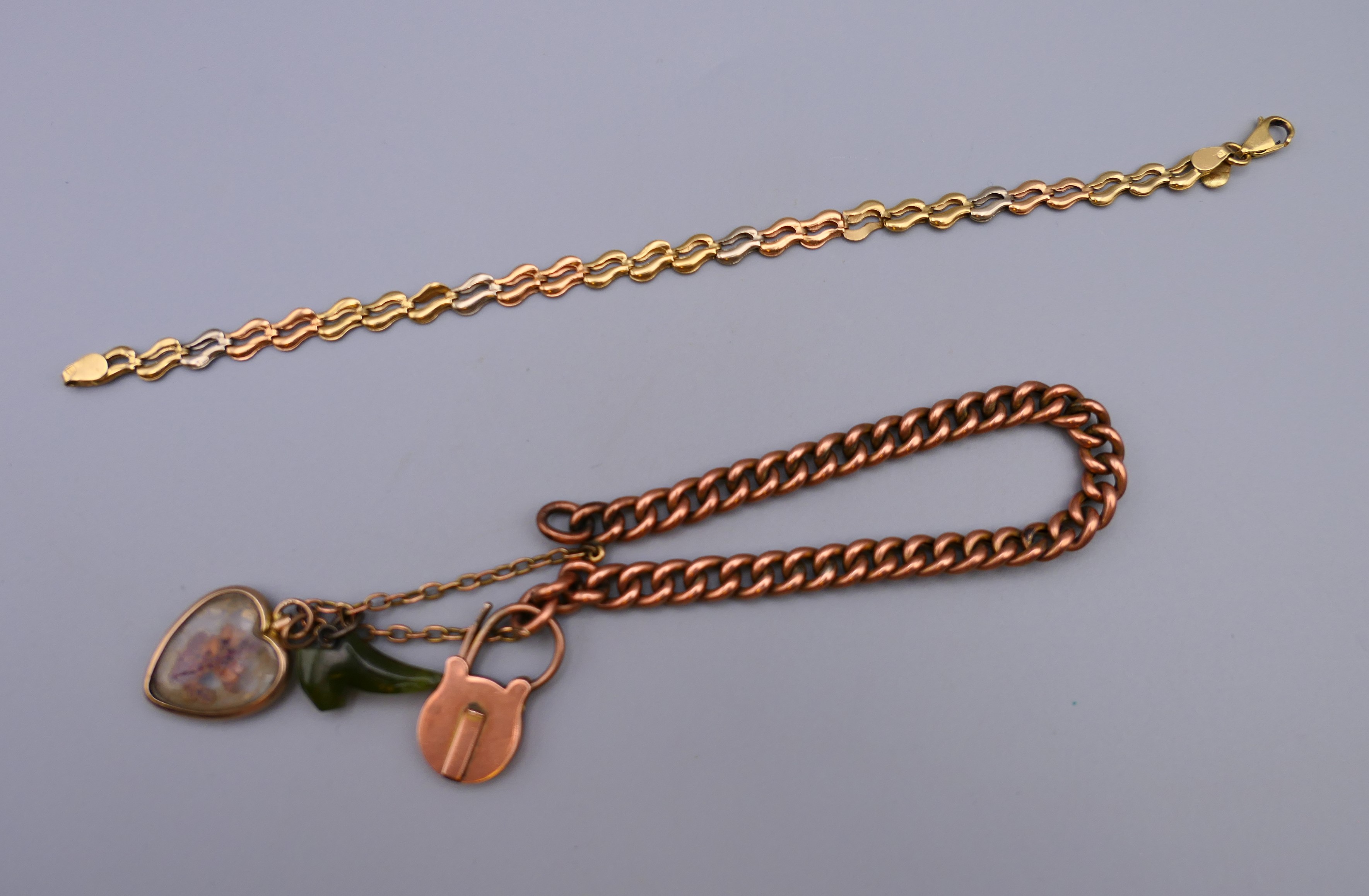 A 9 ct gold bracelet and another gold bracelet, possibly 18 ct gold. 19 cm long and 17 cm long.