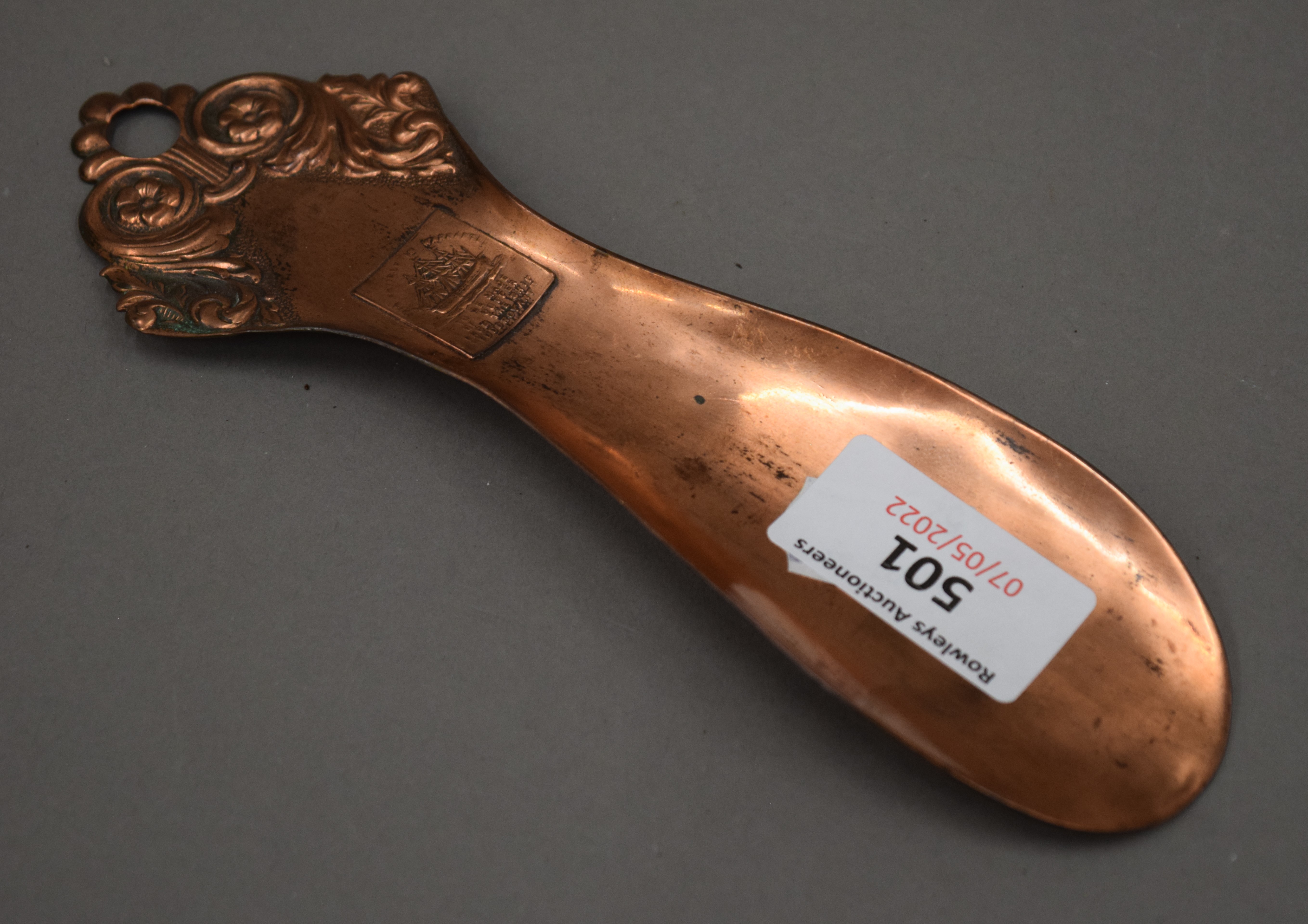 A rare shoe horn made from copper from HMS Foudroyant. 18.5 cm long.