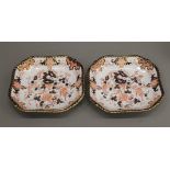 A pair of Crown Derby porcelain dishes. 22.5 cm wide.