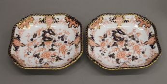 A pair of Crown Derby porcelain dishes. 22.5 cm wide.