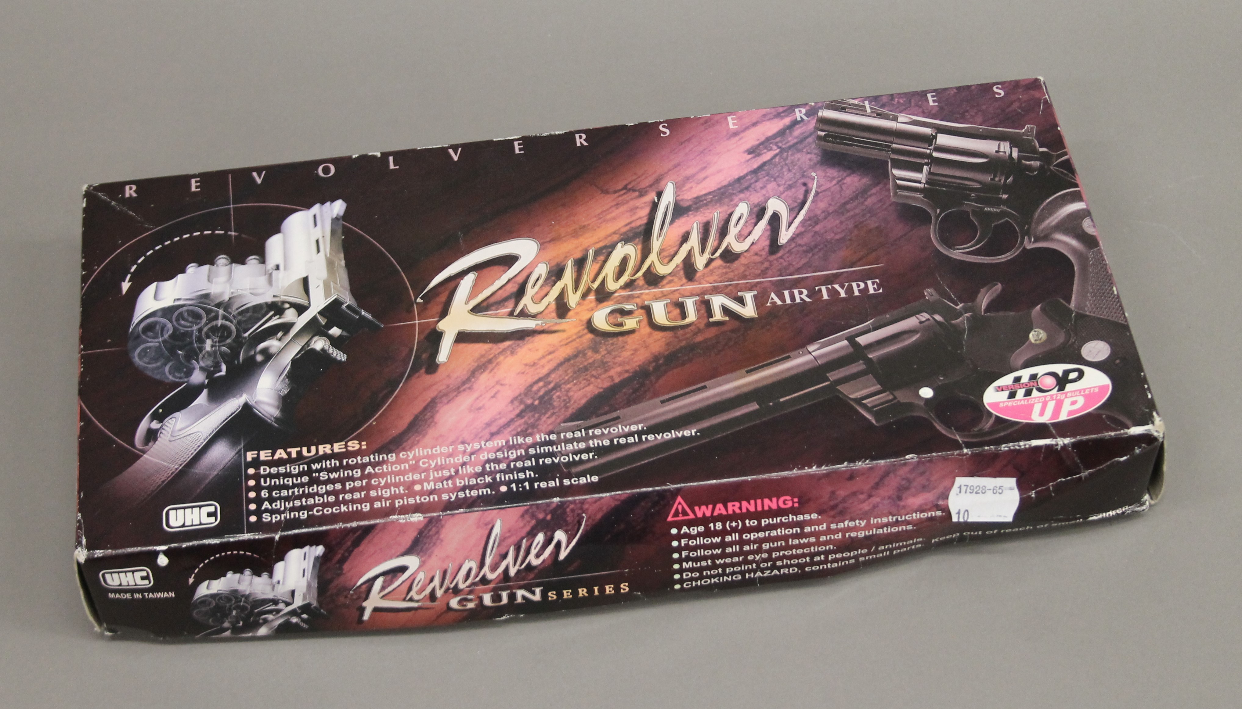 A boxed Air Type revolver.