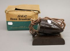 A GEC bakelite Home Broadcaster 1947 microphone with display box.