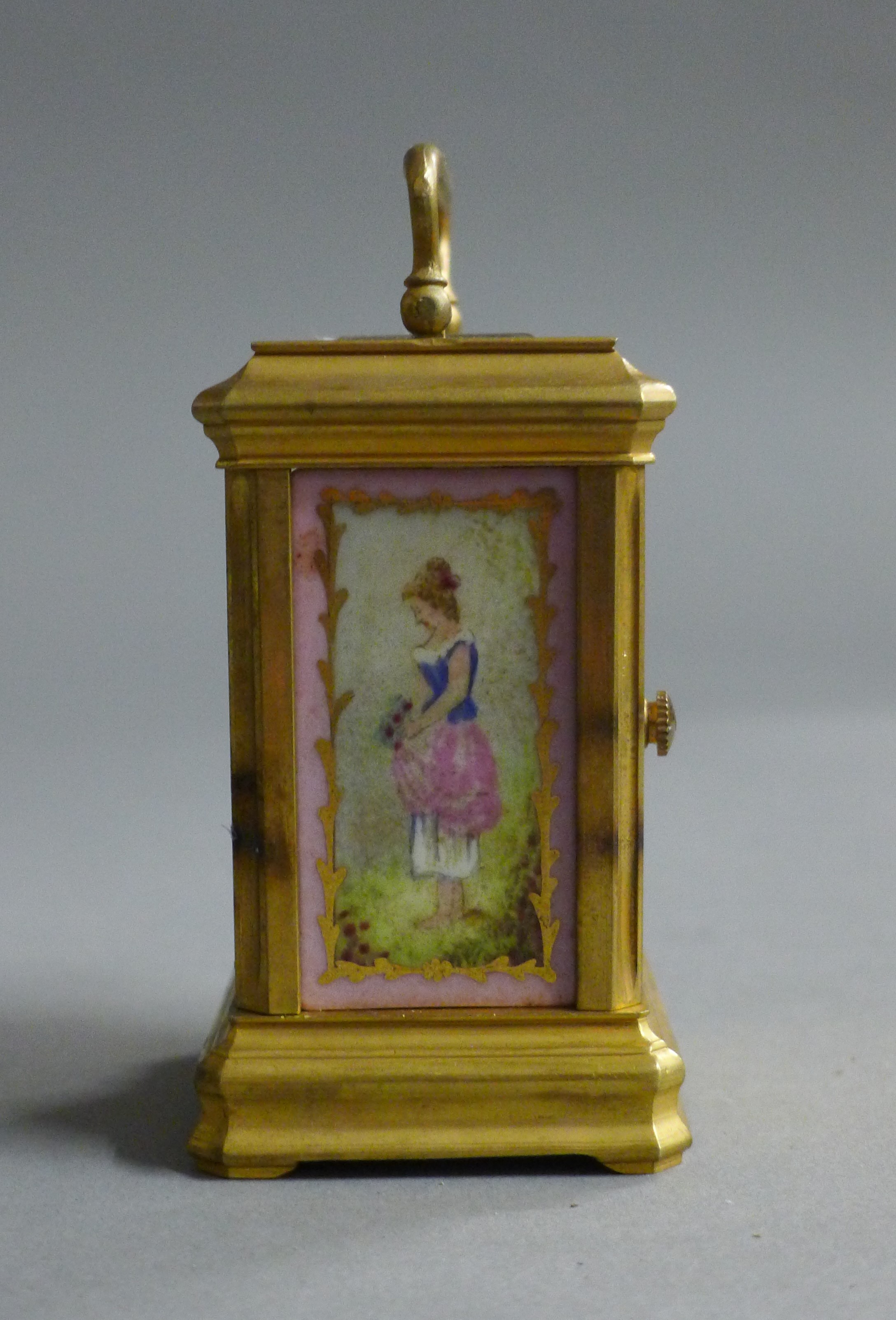 A miniature carriage clock set with porcelain panels. 9 cm high. - Image 5 of 6