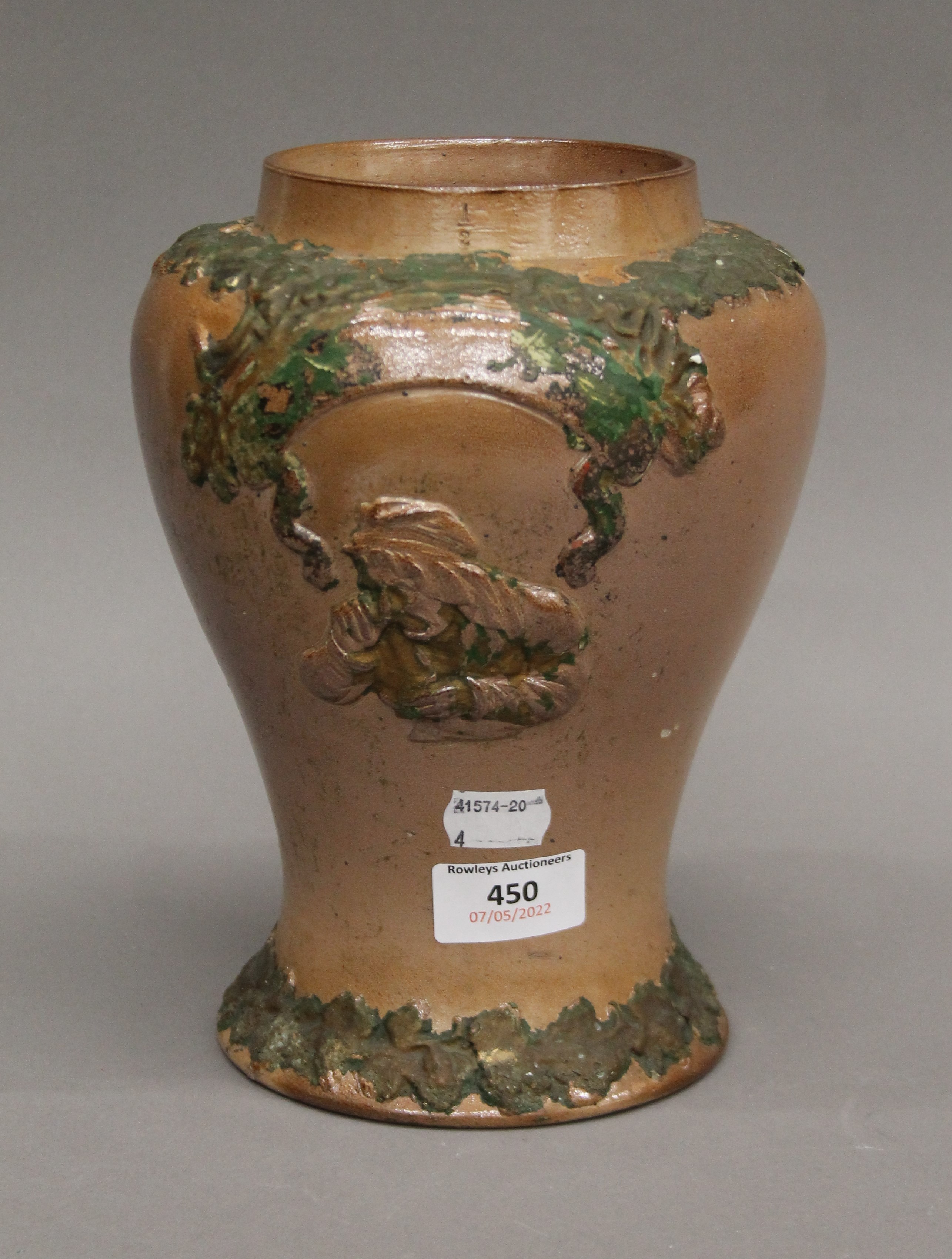A 19th century stoneware shop snuff jar. 23 cm high.