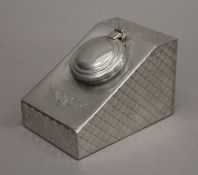 A Bentley inkwell. 6 cm high.