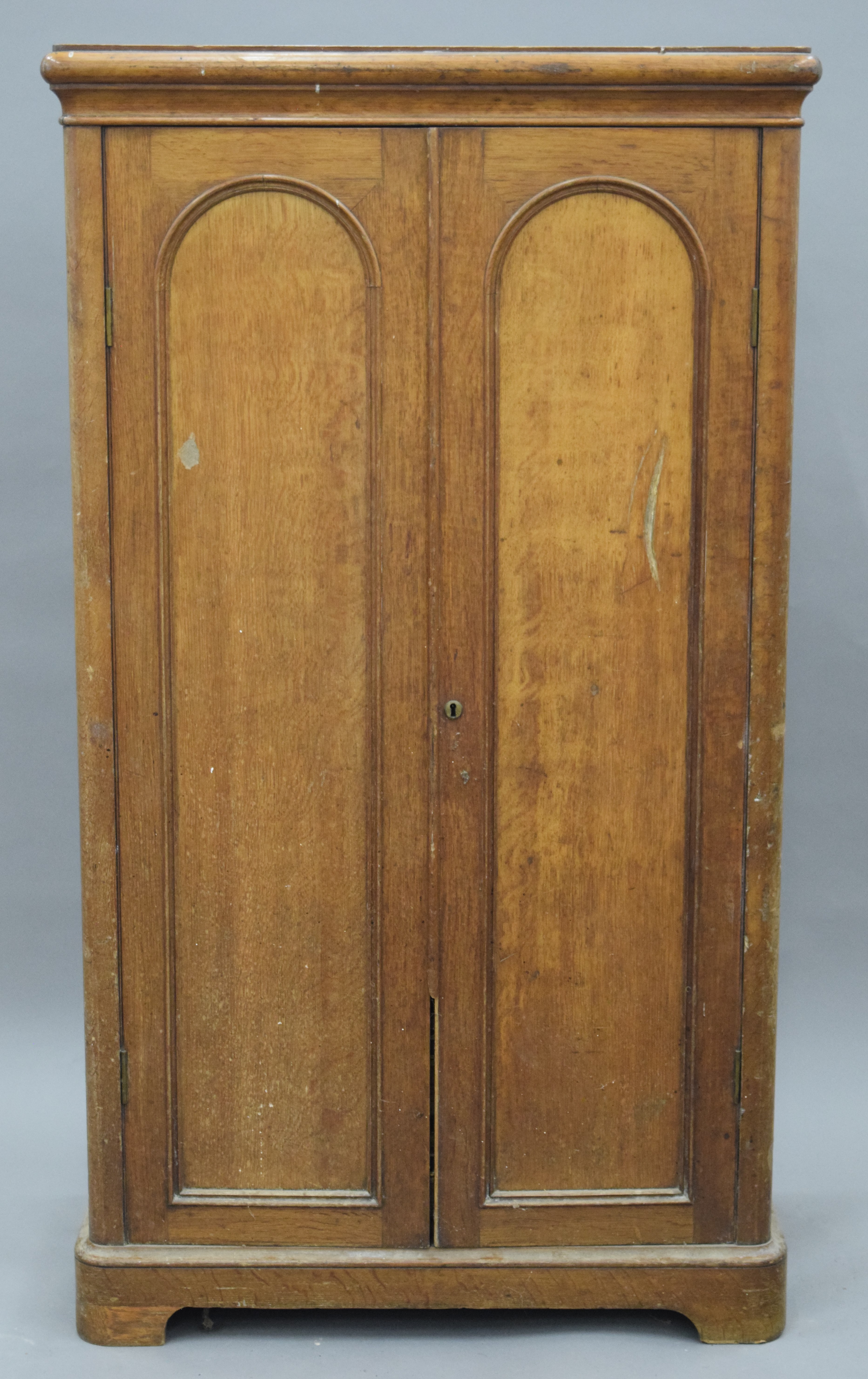 A Victorian oak silver cupboard. 86 cm wide, 47.5 cm deep, 153 cm high.