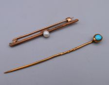 An unmarked 9 ct gold turquoise set stick pin and a 9 ct gold seed pearl set bar brooch.