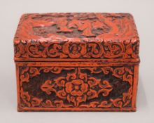 An antique Chinese red cinnabar lacquered box. 13 cm wide.
