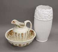 A Victorian wash jug and bowl, and a large vase. The latter 47 cm high.