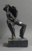 An abstract bronze of two figures. 46 cm high.