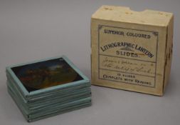 Two sets of magic lantern slides depicting The Relief of Lucknow, one set boxed.