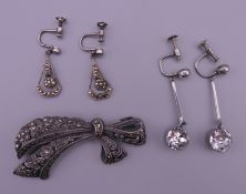 Two pairs of French Art Deco earrings and a marcasite brooch. Brooch 5.