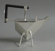 A Christopher Dresser style teapot. 19.5 cm high.