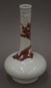 A Chinese porcelain vase decorated with a five clawed dragon,
