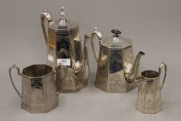 A four-piece silver plated tea set. The largest 24 cm high.