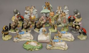 A collection of Royal Albert Beatrix Potter figurines.