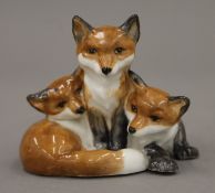 A Royal Worcester 3131 model of fox cubs. 5.5 cm high.
