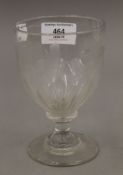 A 19th century etched Masonic glass. 13.5 cm high.