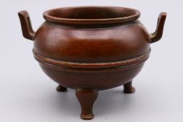 A miniature bronze censer. 4.5 cm high.