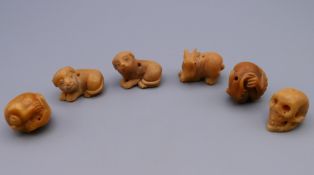 Six small carved netsuke. Hare 2.5 cm long.