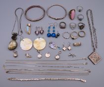 A quantity of silver and other jewellery to include: rings, earrings, necklaces, chains,