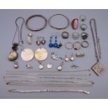 A quantity of silver and other jewellery to include: rings, earrings, necklaces, chains,