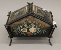 A small Victorian silk lined sewing box. 28 cm long.