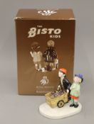 A Royal Doulton The Bisto Kids figurine, boxed.