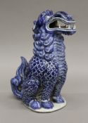 A Chinese pottery dog-of-fo. 30 cm high.