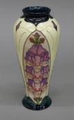 A Moorcroft Foxglove vase. 20 cm high.