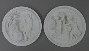 Two decorative plaques. The largest 19 cm diameter.